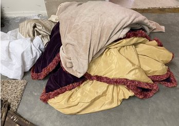 A Collection Of Throws And Draperies