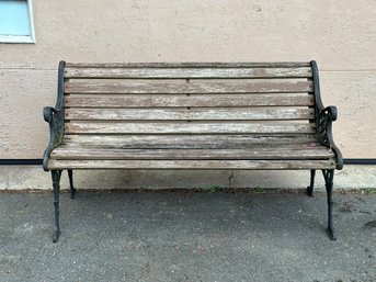 A Classic Park Bench With Cast-Iron Sides & Wooden Slats