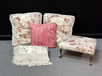 A Coordinated Set Of Toss Pillows, Throw & Foot Stool