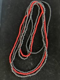 Three Long Beaded Strand Necklaces