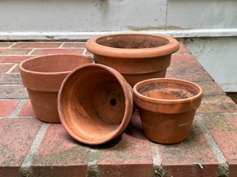 A Grouping Of Terracotta Planter Pots