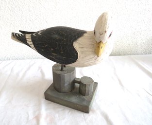 Carved Wood Seagull Sitting On Dock Stand