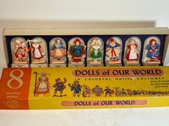 8 PLASTIC DOLLS OF THE WORLD WITH PAPER  WORK AND FLAGS - BY COMMONWEALTH PRODUCTS CORP