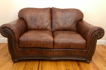 Phenomenal Leather Loveseat With Nail Head Trim Accents