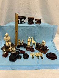 Collection Of Asian Carvings And Wood Stands