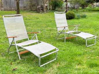 A Pair Of Vintage Aluminum And Mesh Chairs