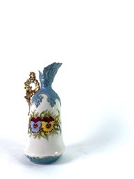 Italian Porcealin Decanter With Pansie Motif And Gold Trimmed Handle And Spout