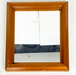 A Vintage Mirror In Canadian Fruit Wood Frame