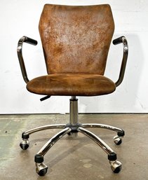 An Adjustable Desk Chair In Faux Distressed Leather By Pottery Barn Teen