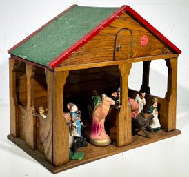 A Vintage Creche And Painted Plaster Nativity Figures