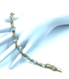 Gorgeous Goldtone Tennis Bracelet W/ Pale Blue Stones