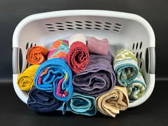 A Laundry Basket With Assorted Towels