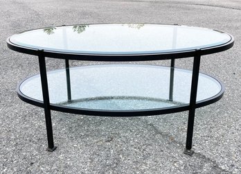 A Modern Wrought Iron And Glass Coffee Table