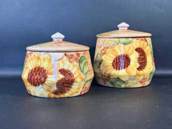A Pair Of Ceramic Canisters With A Sunflower Motif