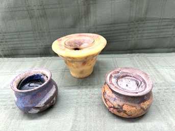 Three Candles, Two In Pottery Candle Holders