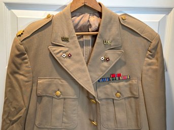 A Vintage WWII Military Coat In Khaki