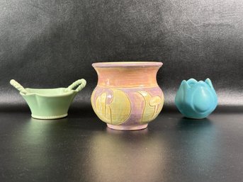 A Grouping Of Compatible Pottery In Pastel Tones