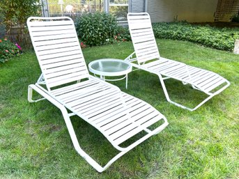 Pair Of Aluminum Loungers And Round Cocktail Table