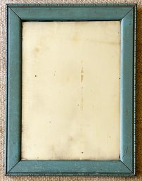 An Antique Mirror In Painted Wood Frame