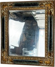 An Elegant Beveled Mirror In Neoclassical Style Frame