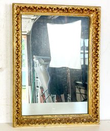 A Carved Gilt Wood Framed Mirror