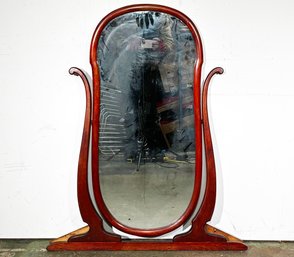 A Large Vintage Cherry Wood Mirror