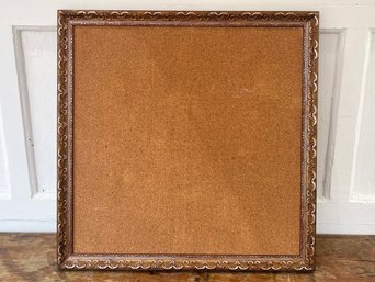 A Large Framed Cork Board