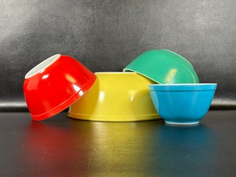 A Fabulous Complete Set Of Vintage Mid-Century Classic Pyrex Mixing Bowls In Primary Colors