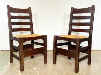 A Pair Of Stickley Mission Oak Rush Seated Ladder Back Side Chairs, Unsigned