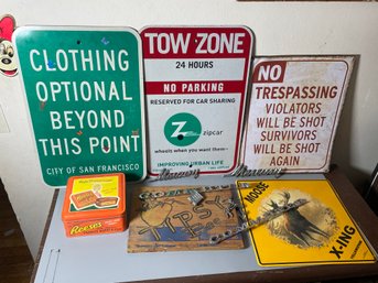 LOT OF STREET SIGNS AND CAR EMBLEMS
