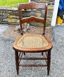 A Vintage Ladder Back Cane Seated Side Chair