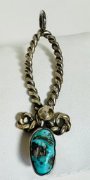 VINTAGE LONG TWISTED STERLING SILVER CHUNK TURQUOISE PENDANT