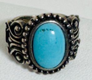 SIGNED NV STERLING SILVER AND TURQUOISE RING