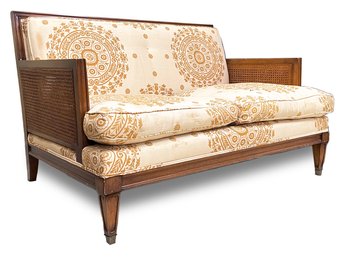 A Stylish Vintage Cane And Upholstered Loveseat C. 19070's By W.J. Sloan