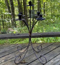 A Large Wrought Iron Candelabrum