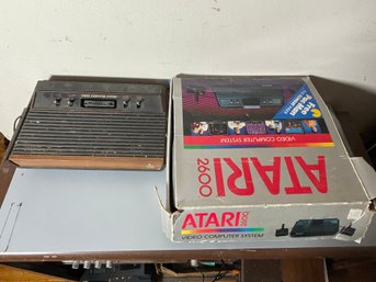 TWO ATARI 2600 SYSTEMS, ONE WITH BOX