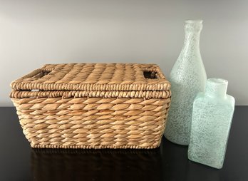 Basket With Lid And Frosted Green Glass Bottles