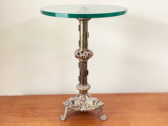 An Ornante Brass And Glass Side Table