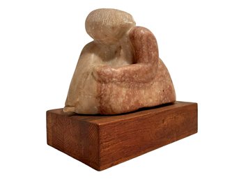 Stone Sculpture Of A Female Form On Wood Block. The Block Is Signed E. Symons.