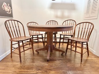 Late 1800's Oak Dining Table And Five Spindle Back Chairs , Two 10' Leaves