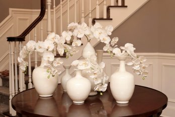 White Ceramic Vase Collection With Orchids