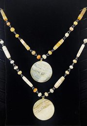 Two Stone Necklaces With Large Carved Agate Pendants