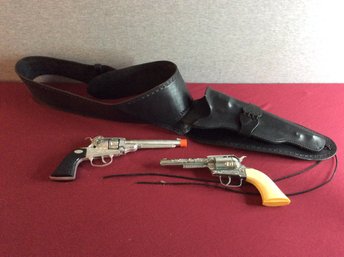 Hand Made Stamped Leather Holster With Toy Guns