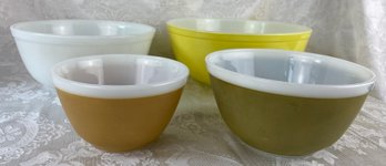 Four Pyrex Mixing Bowls