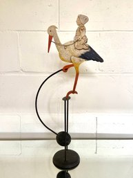 Baby On Stork Iron Balance Pendulum 21in