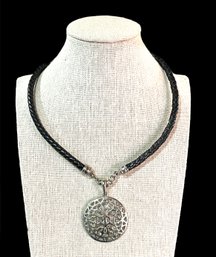 Beautiful Ornate Pendant With Braided Leather Chord Necklace