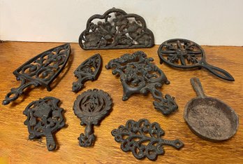 Group Of Nine Vintage Cast Iron Pieces, Mostly Trivets