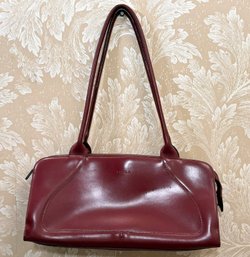 A Ladies Handbag By Furla