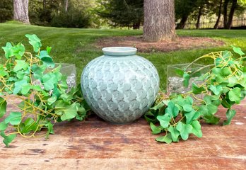 A Large Bird Motif Vase And Glass Cubes With Faux Floral