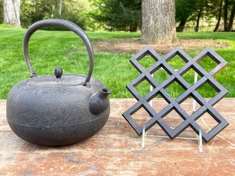 A Vintage Tetsubin And Trivet